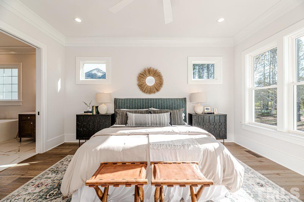 1501 Kirkby Lane Raleigh, NC 27614 - Photo 29 of 54 a bedroom with a bed and a window