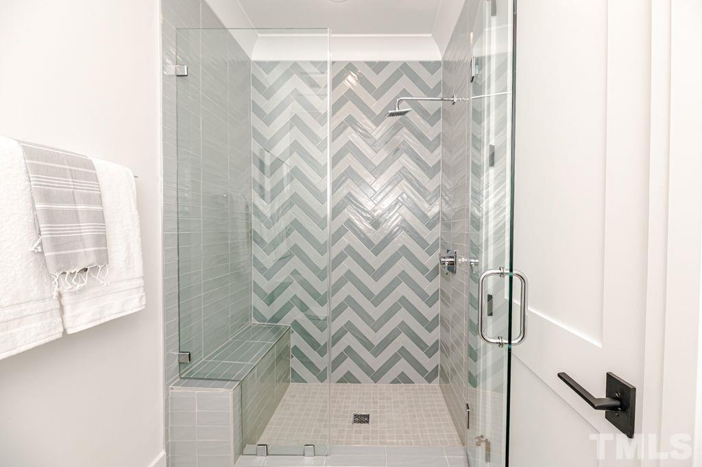 1501 Kirkby Lane Raleigh, NC 27614 - Photo 39 of 54 a bathroom with a shower curtain and a shower curtain