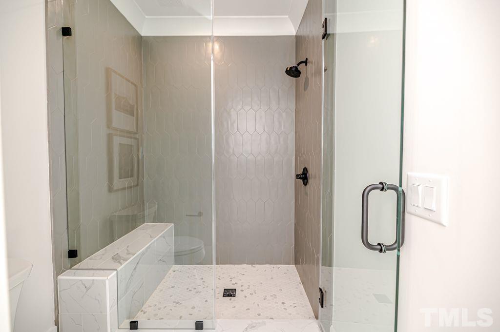 1501 Kirkby Lane Raleigh, NC 27614 - Photo 46 of 54 a bathroom with a granite countertop shower and a sink