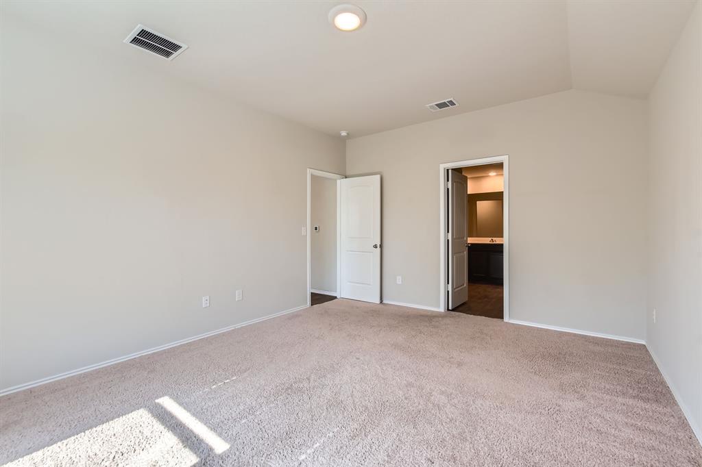 6417 Wideleaf Drive Austin, TX 78724 - Photo 13 of 27 a view of an empty room with closet and a window