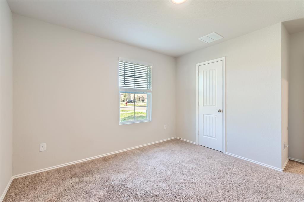 6417 Wideleaf Drive Austin, TX 78724 - Photo 17 of 27 a view of an empty room with a window
