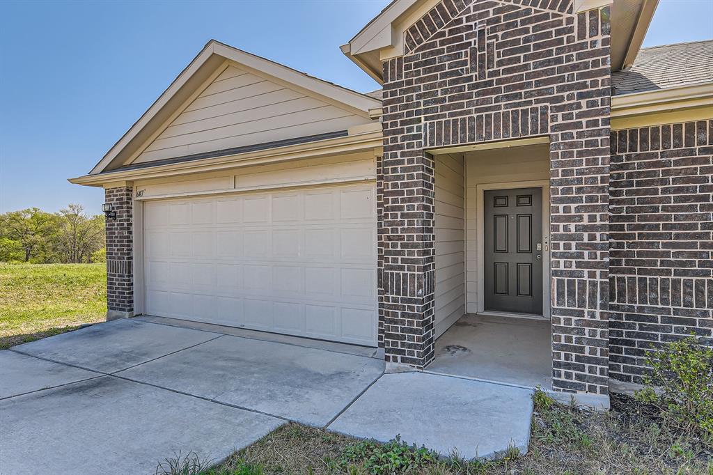 6417 Wideleaf Drive Austin, TX 78724 - Photo 4 of 27 a view of house with backyard and garden