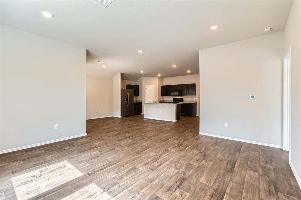 6417 Wideleaf Drive Austin, TX 78724 - Photo 8 of 27 a view of kitchen with refrigerator and window