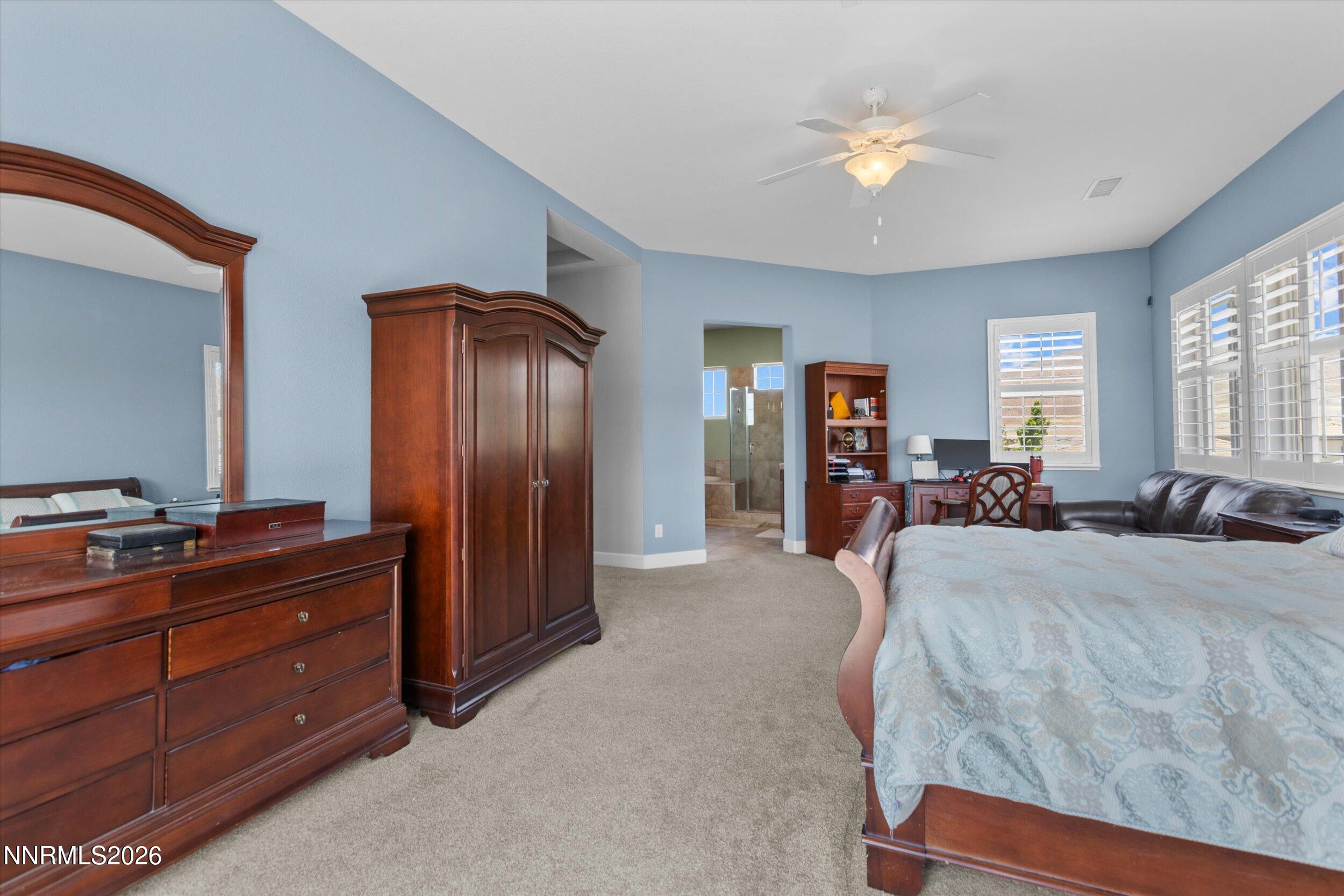 2920 Bull Rider Drive Reno, NV 89521 - Photo 33 of 51 a bed room with a bed and a dresser