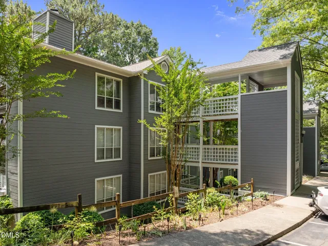 a house with a tree in front of it