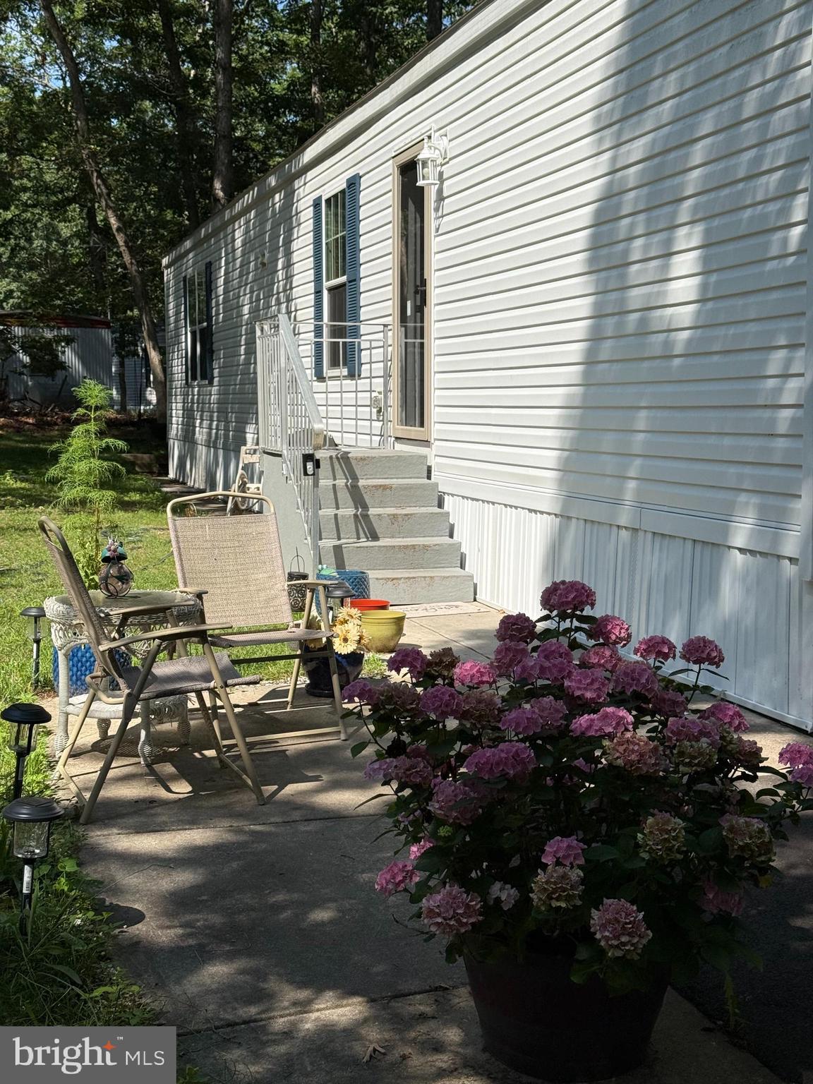 2110 Mays Landing Road, Unit 73 Millville, NJ 08332 - Photo 1 of 11 a view of a back yard of the house