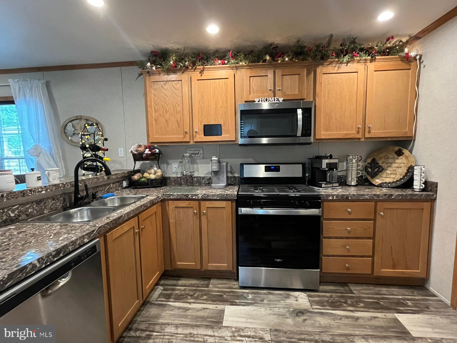2110 Mays Landing Road, Unit 73 Millville, NJ 08332 - Photo 7 of 11 a kitchen with a sink stove and microwave