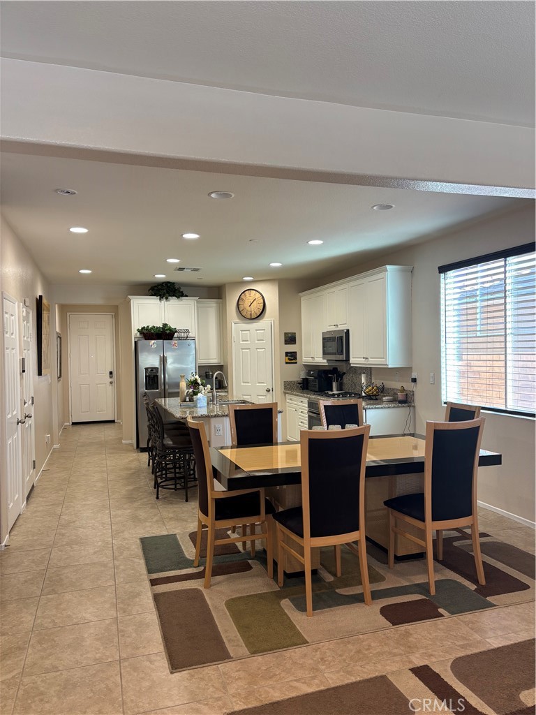 2534 Mapleleaf Terrace Palmdale, CA 93551 - Photo 11 of 48 a view of a dining room with furniture