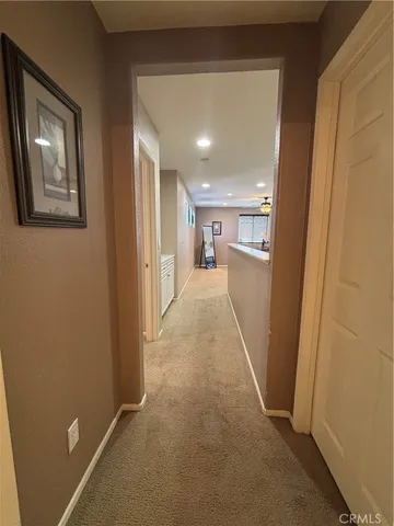 a view of a patio with table and chairs with wooden floor