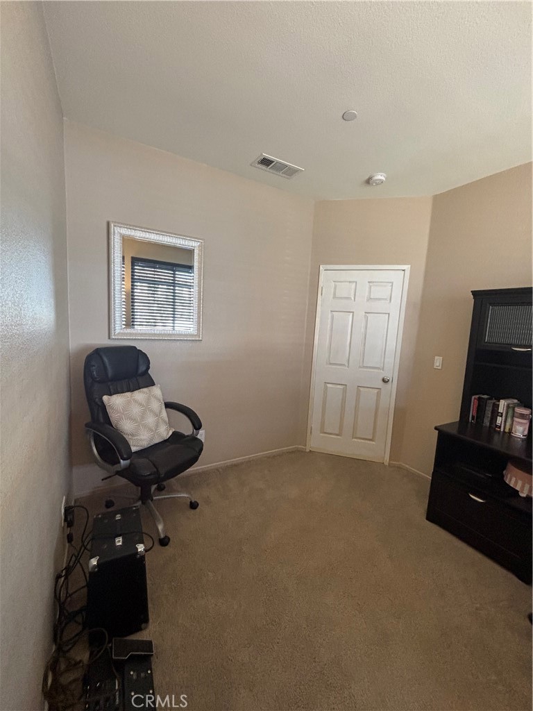 2534 Mapleleaf Terrace Palmdale, CA 93551 - Photo 5 of 48 a living room with furniture and a window