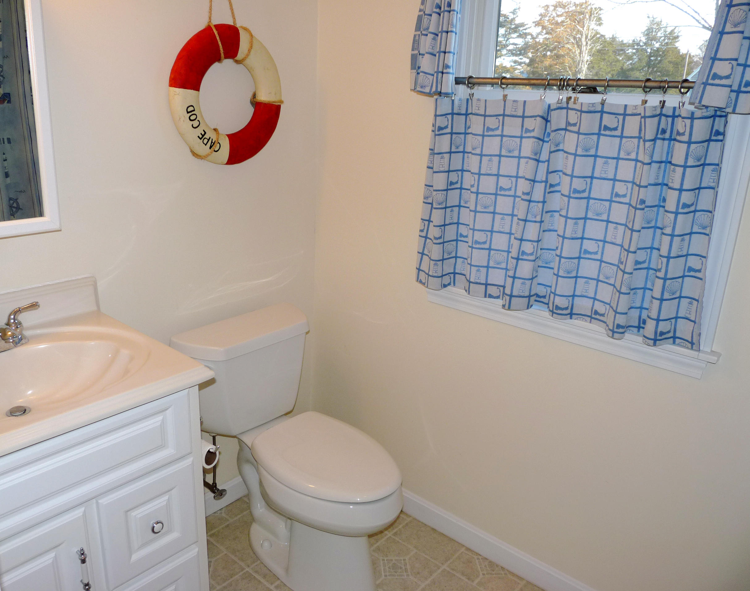 170 Beach Road, Unit 10 Orleans, MA 02653 - Photo 15 of 23 a bathroom with a sink and a toilet