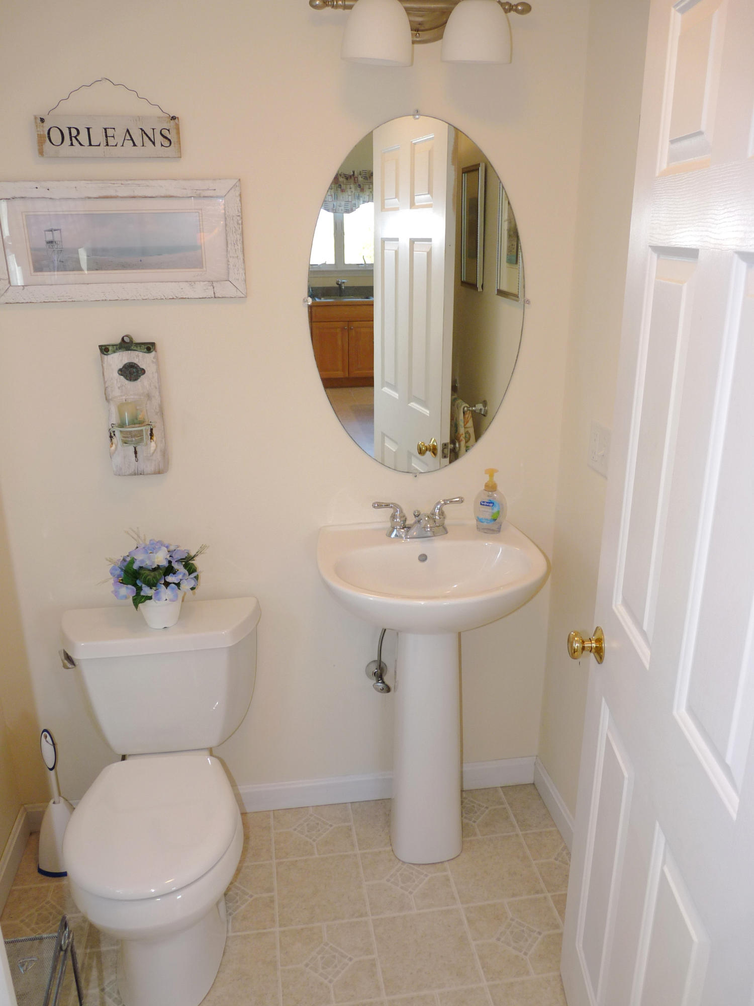 170 Beach Road, Unit 10 Orleans, MA 02653 - Photo 16 of 23 a bathroom with a toilet sink and mirror