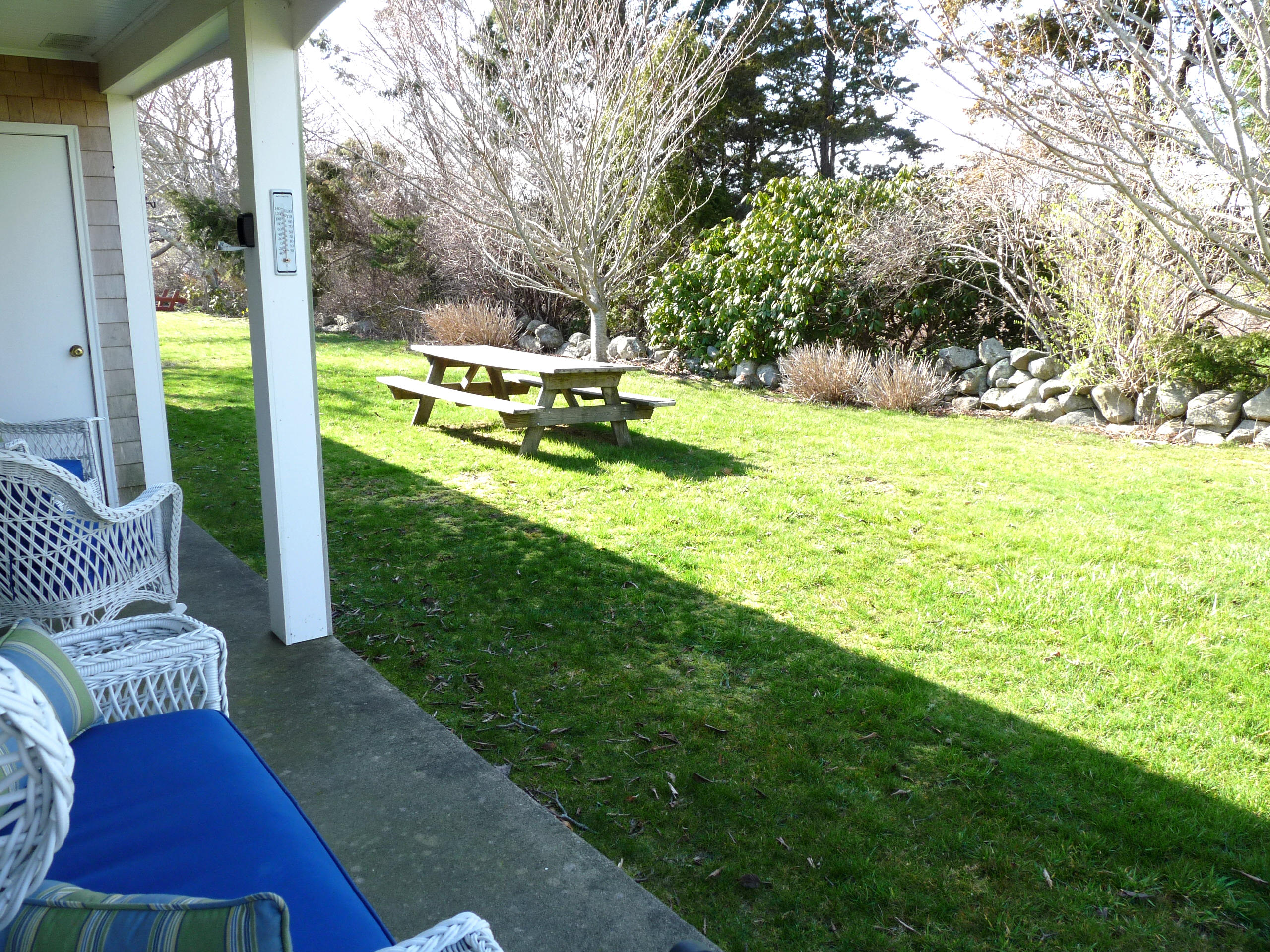 170 Beach Road, Unit 10 Orleans, MA 02653 - Photo 18 of 23 a view of backyard with trampoline