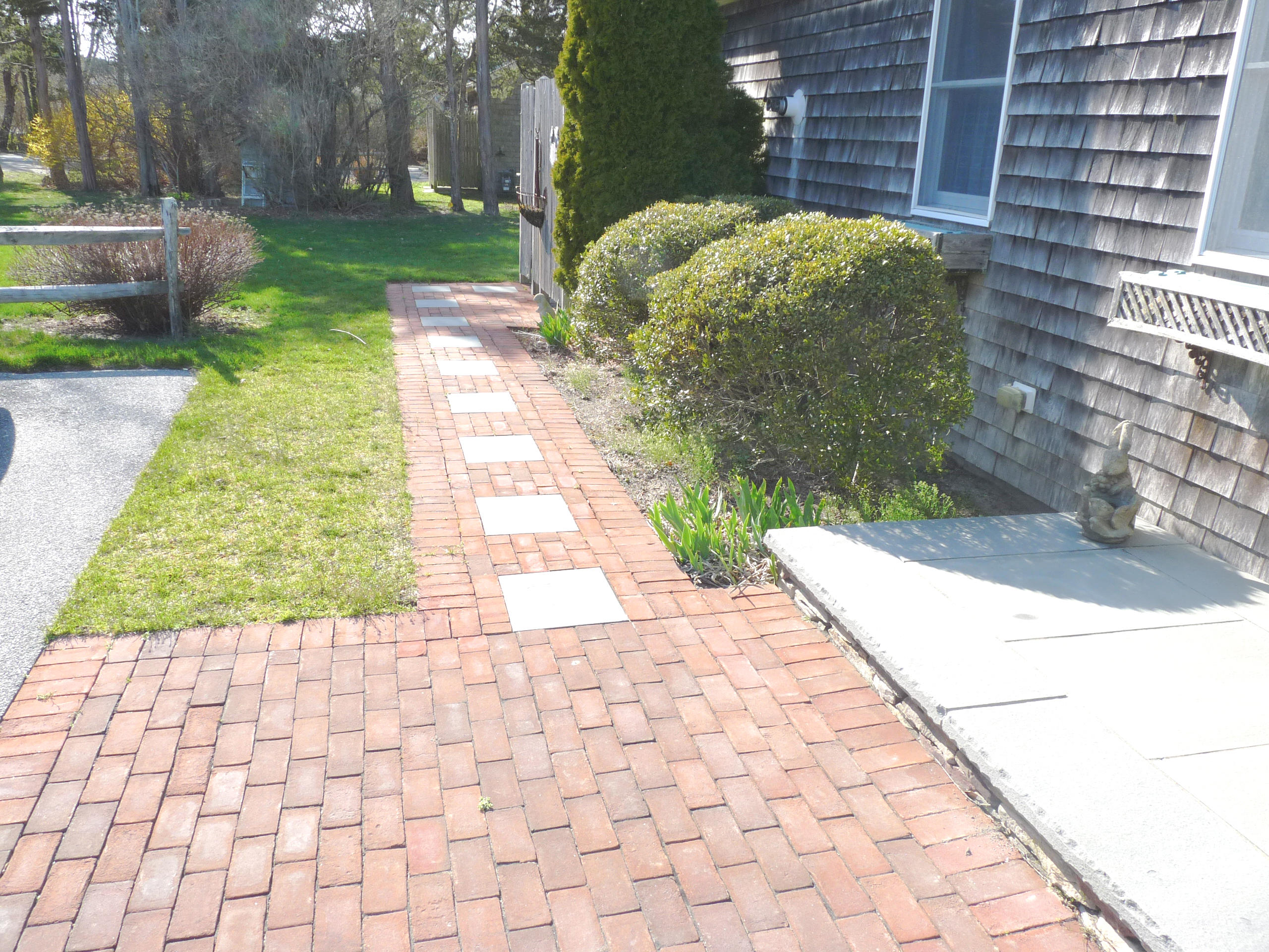 170 Beach Road, Unit 10 Orleans, MA 02653 - Photo 20 of 23 a view of a backyard with pathway