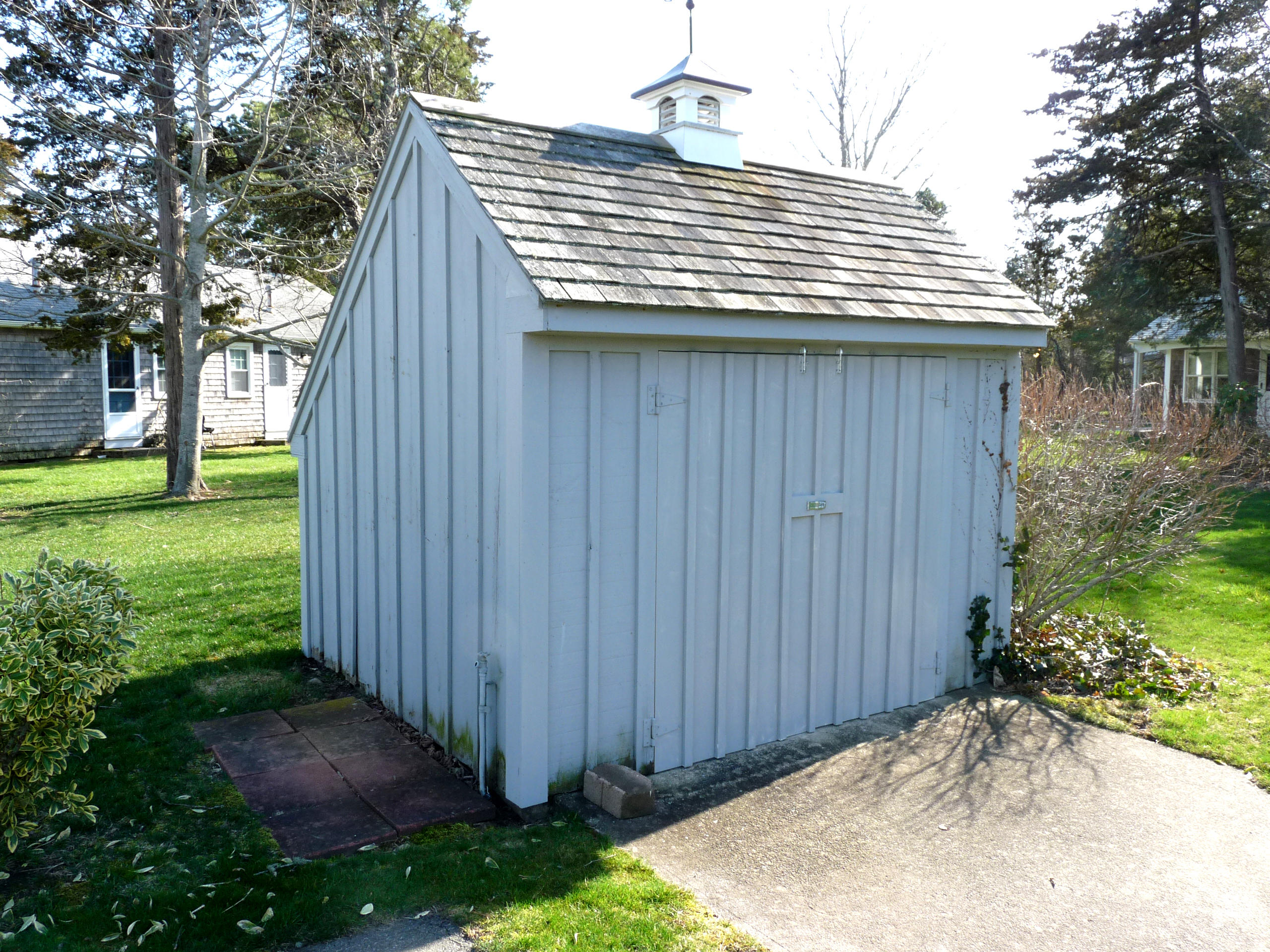170 Beach Road, Unit 10 Orleans, MA 02653 - Photo 21 of 23 a backyard of a house with lots of green space