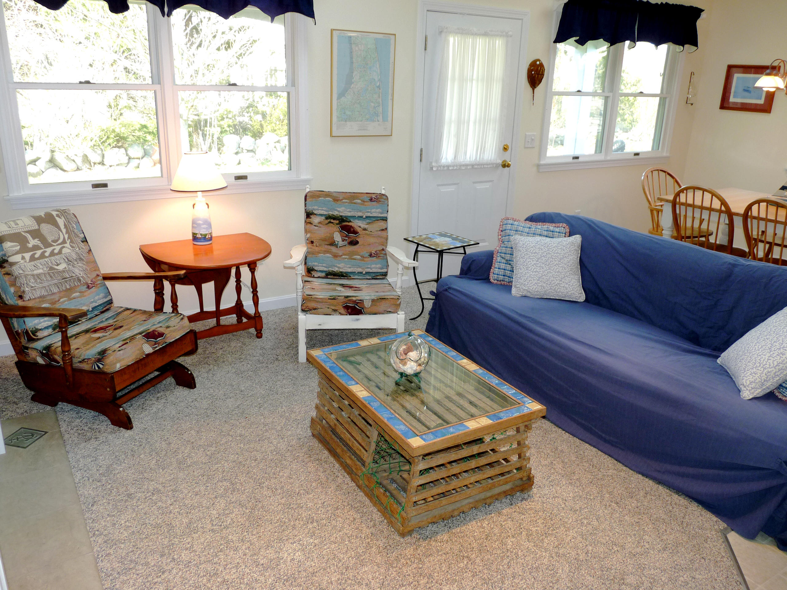 170 Beach Road, Unit 10 Orleans, MA 02653 - Photo 7 of 23 a living room with furniture and a window