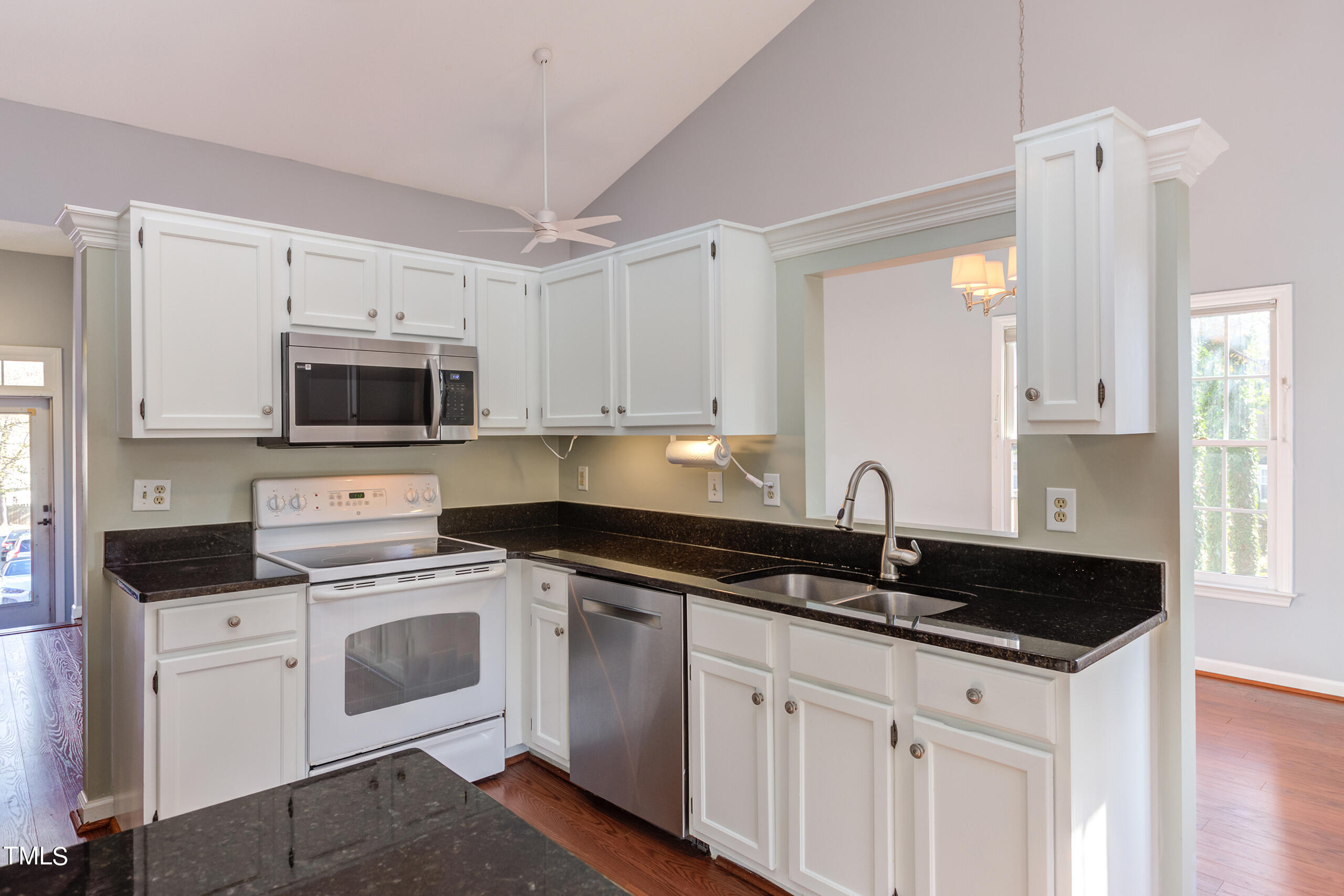 2800 Polesdon Court Raleigh, NC 27615 - Photo 7 of 21 Well-appointed kitchen features plenty of cabinet space and granite countertops.
