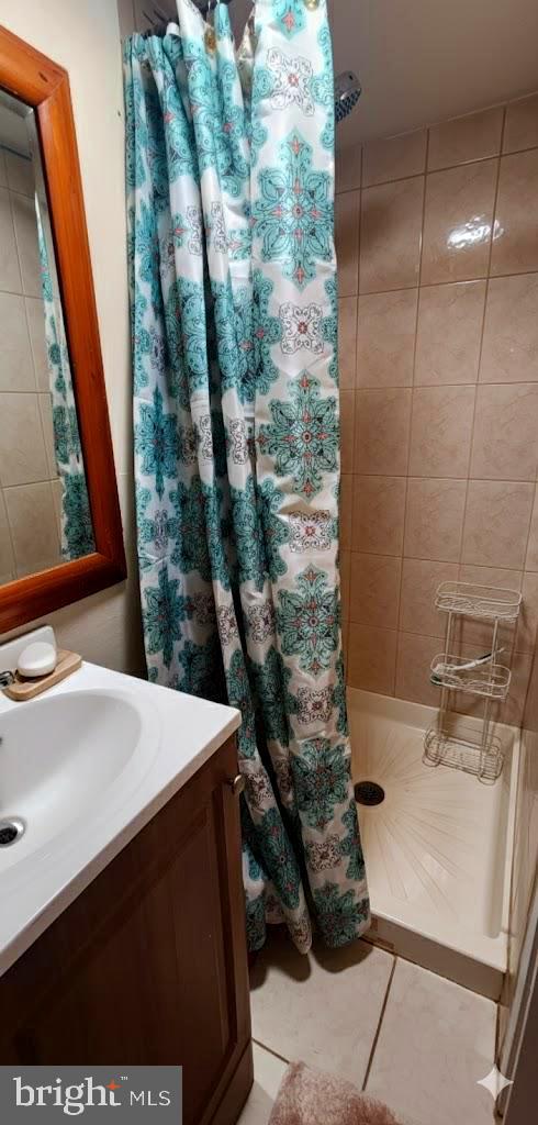850 Orchard Avenue Runnemede, NJ 08078 - Photo 18 of 26 a bathroom with a sink and a mirror