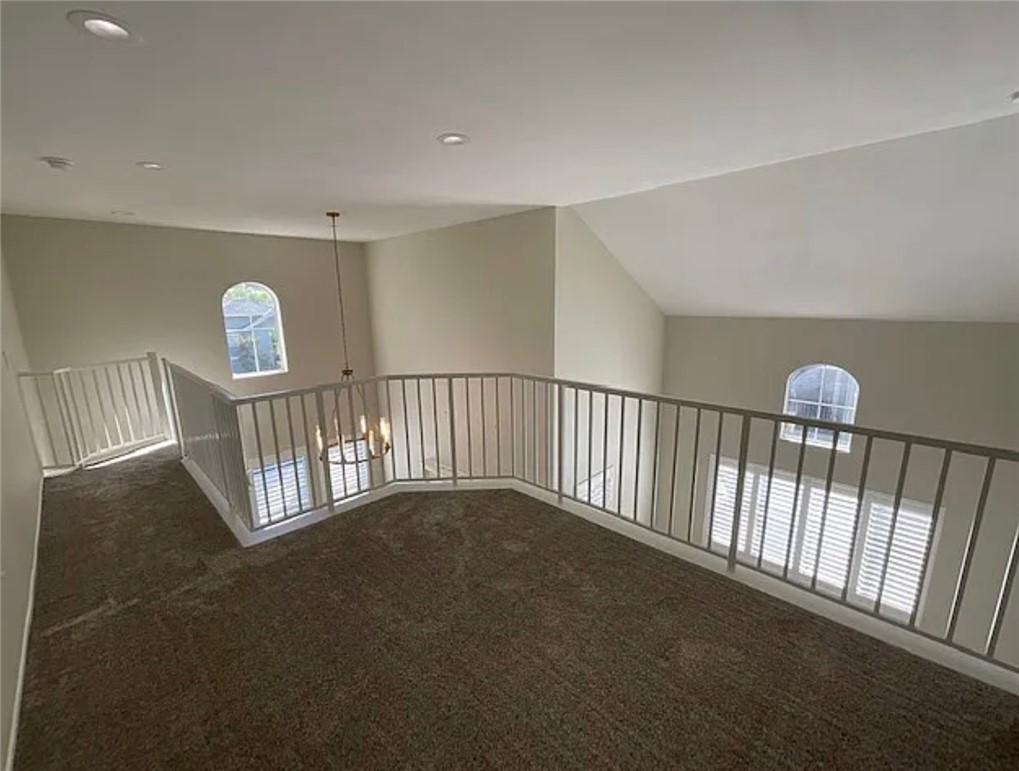 20000 Plum Canyon Road, Unit 225 Saugus, CA 91350 - Photo 8 of 12 a view of an empty room with wooden floor