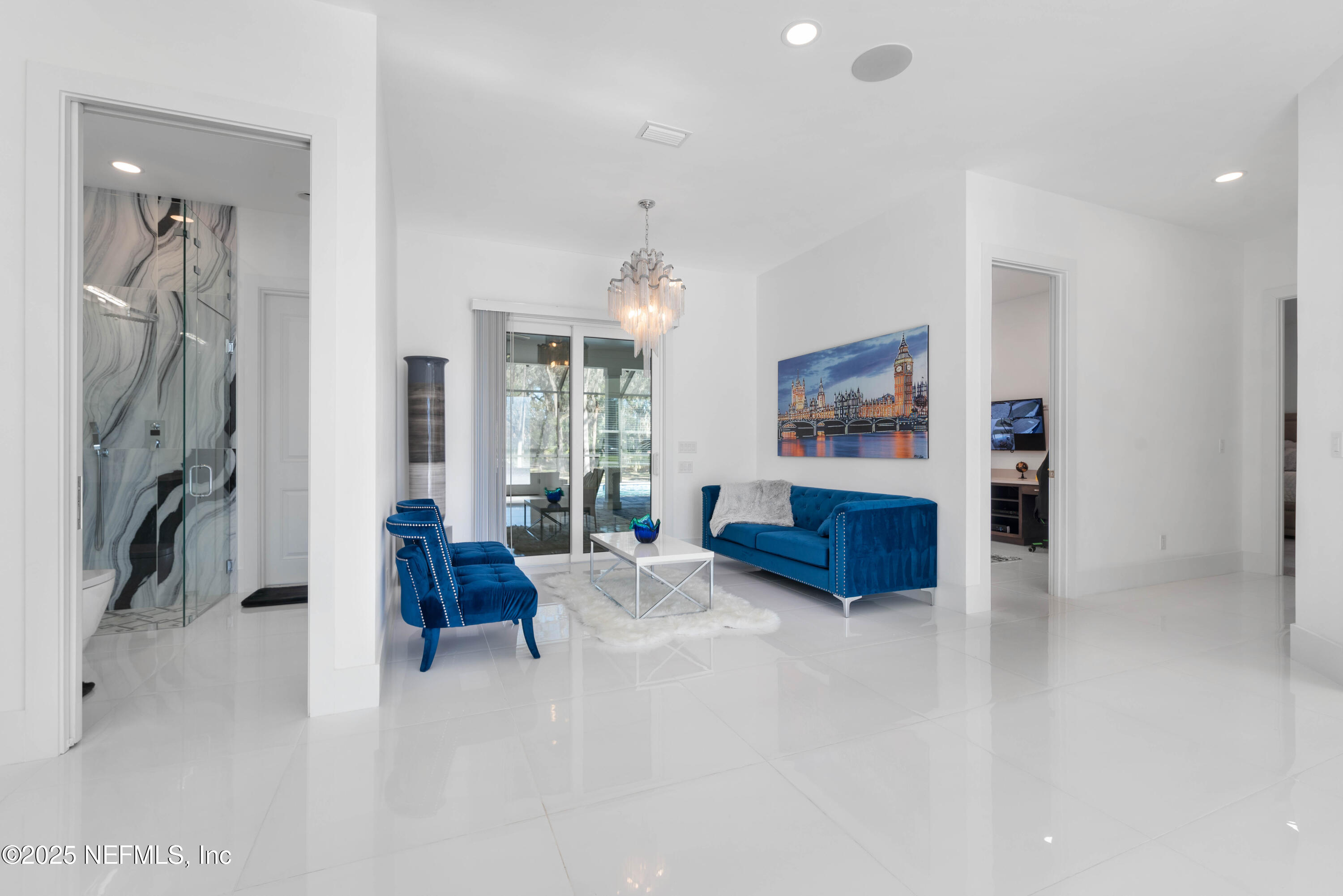 95494 Arbor Lane Fernandina Beach, FL 32034 - Photo 13 of 45 a living room with furniture and a flat screen tv