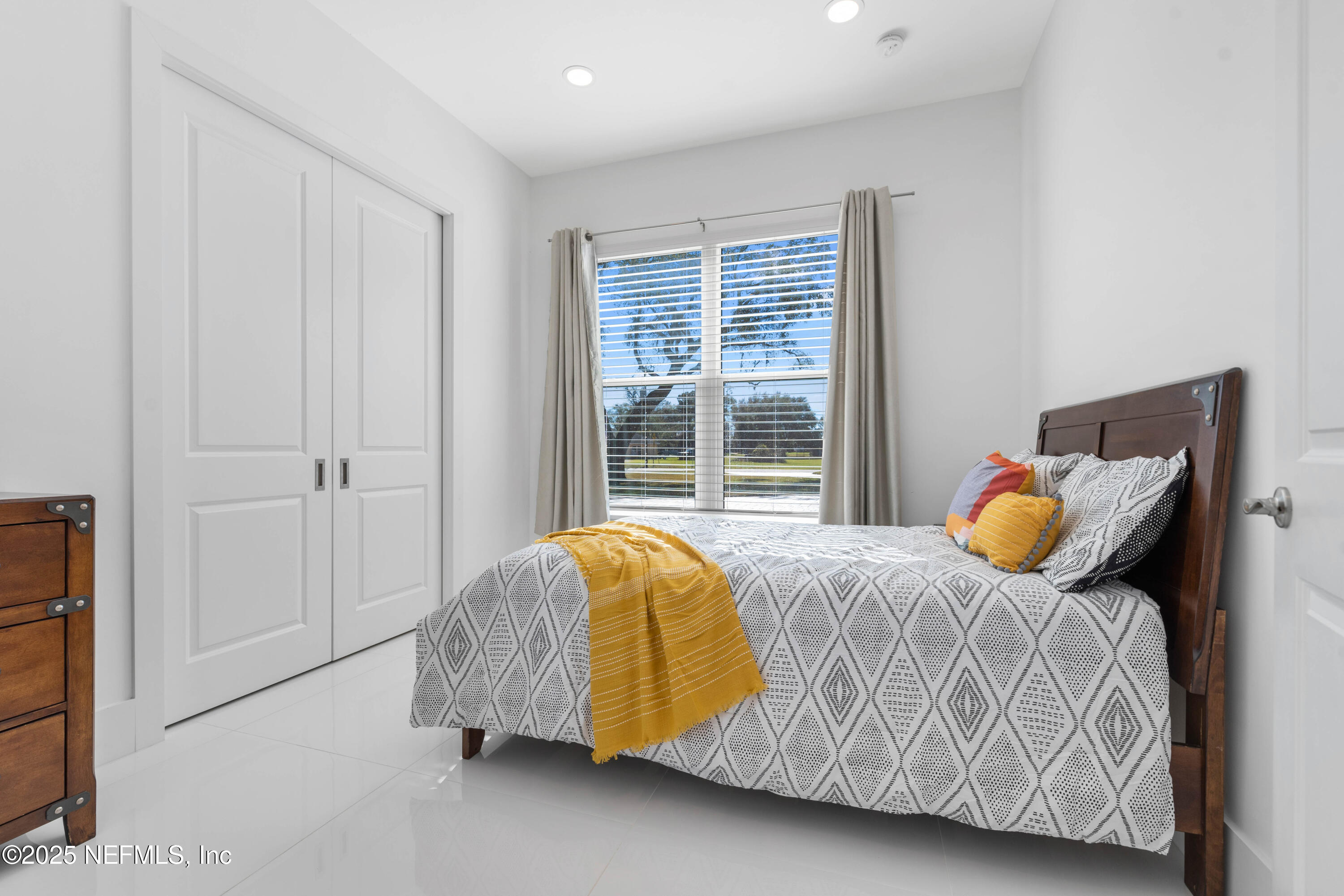 95494 Arbor Lane Fernandina Beach, FL 32034 - Photo 15 of 45 a bedroom with a bed and window