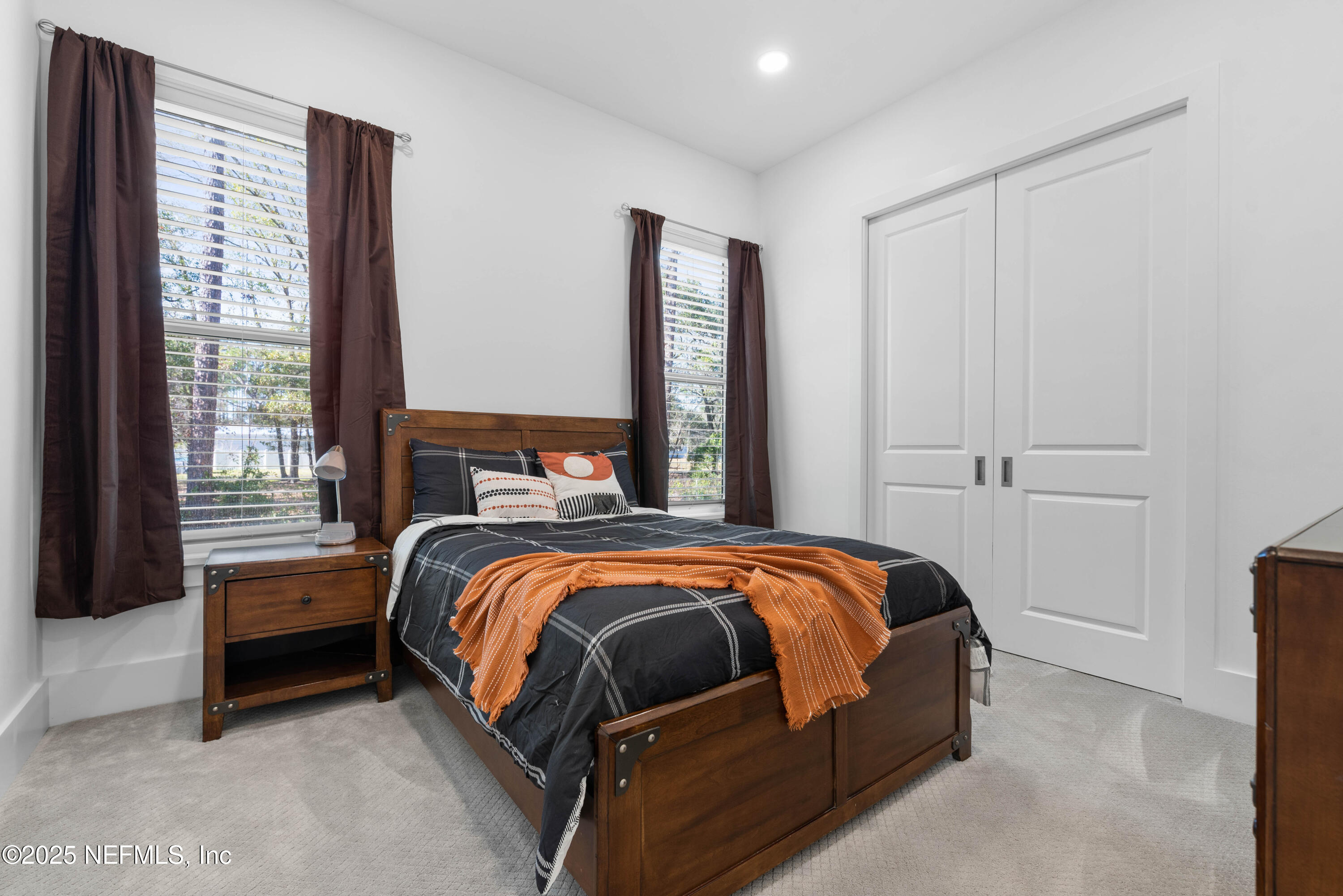 95494 Arbor Lane Fernandina Beach, FL 32034 - Photo 19 of 45 a bedroom with a bed and window
