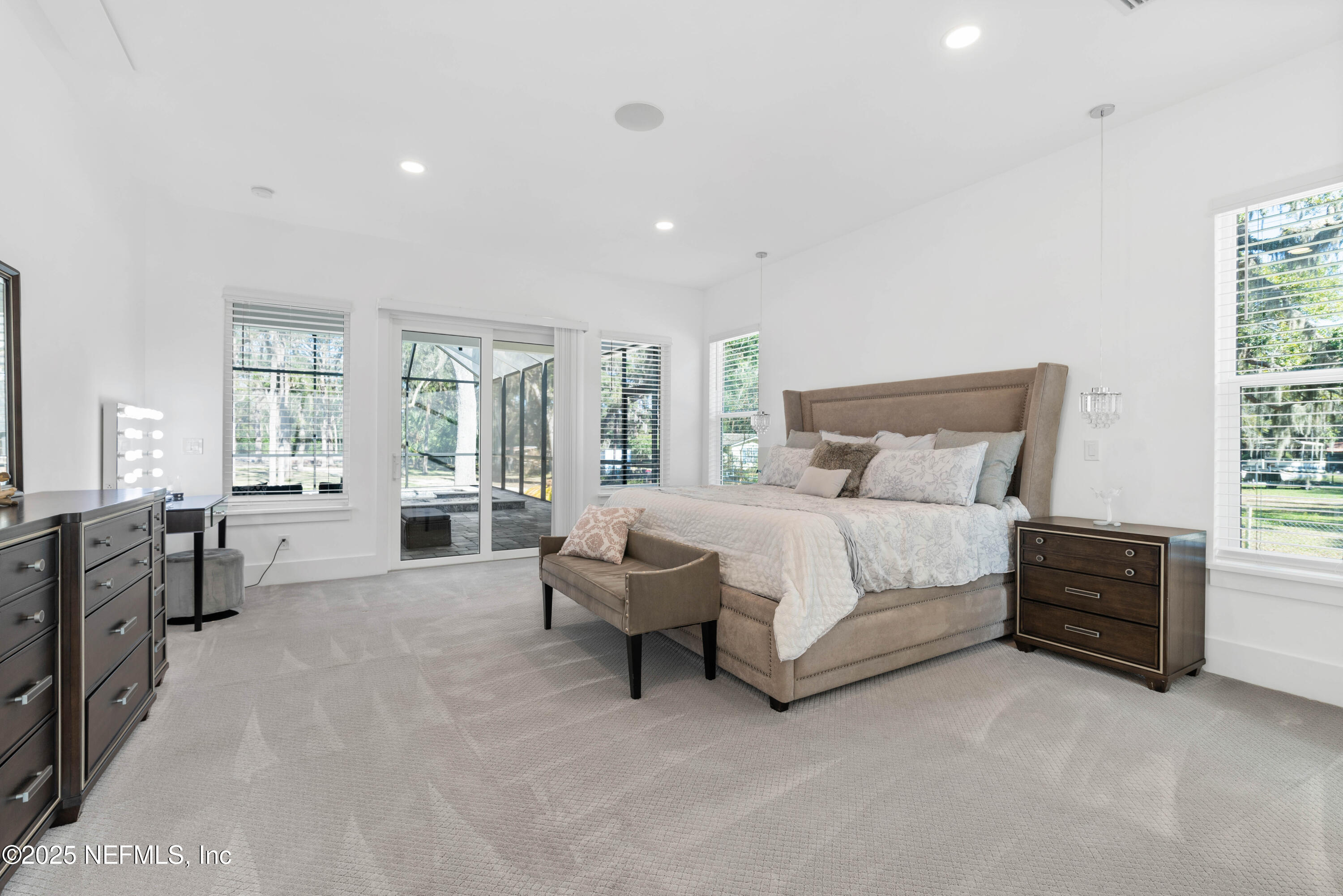 95494 Arbor Lane Fernandina Beach, FL 32034 - Photo 20 of 45 a bedroom with furniture and a large window