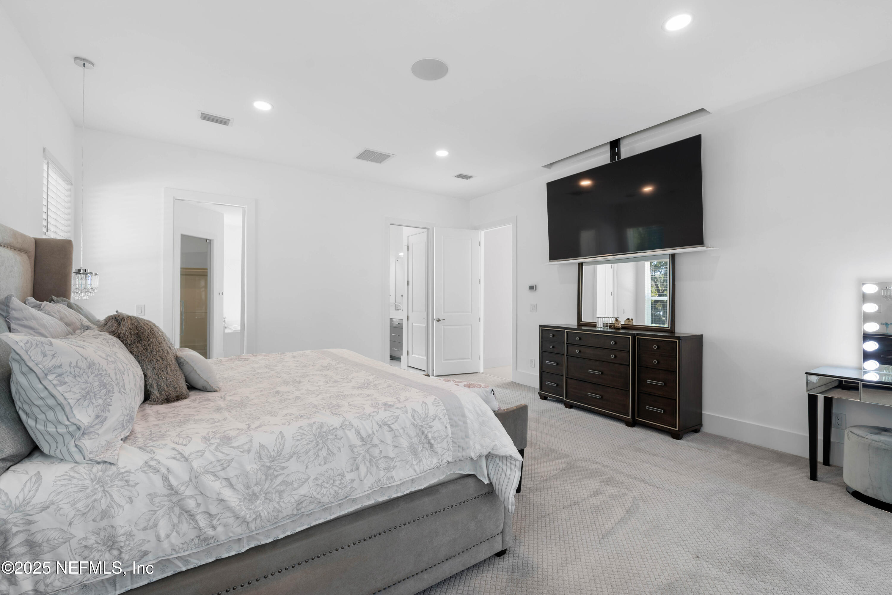 95494 Arbor Lane Fernandina Beach, FL 32034 - Photo 21 of 45 a bedroom with a bed and a television