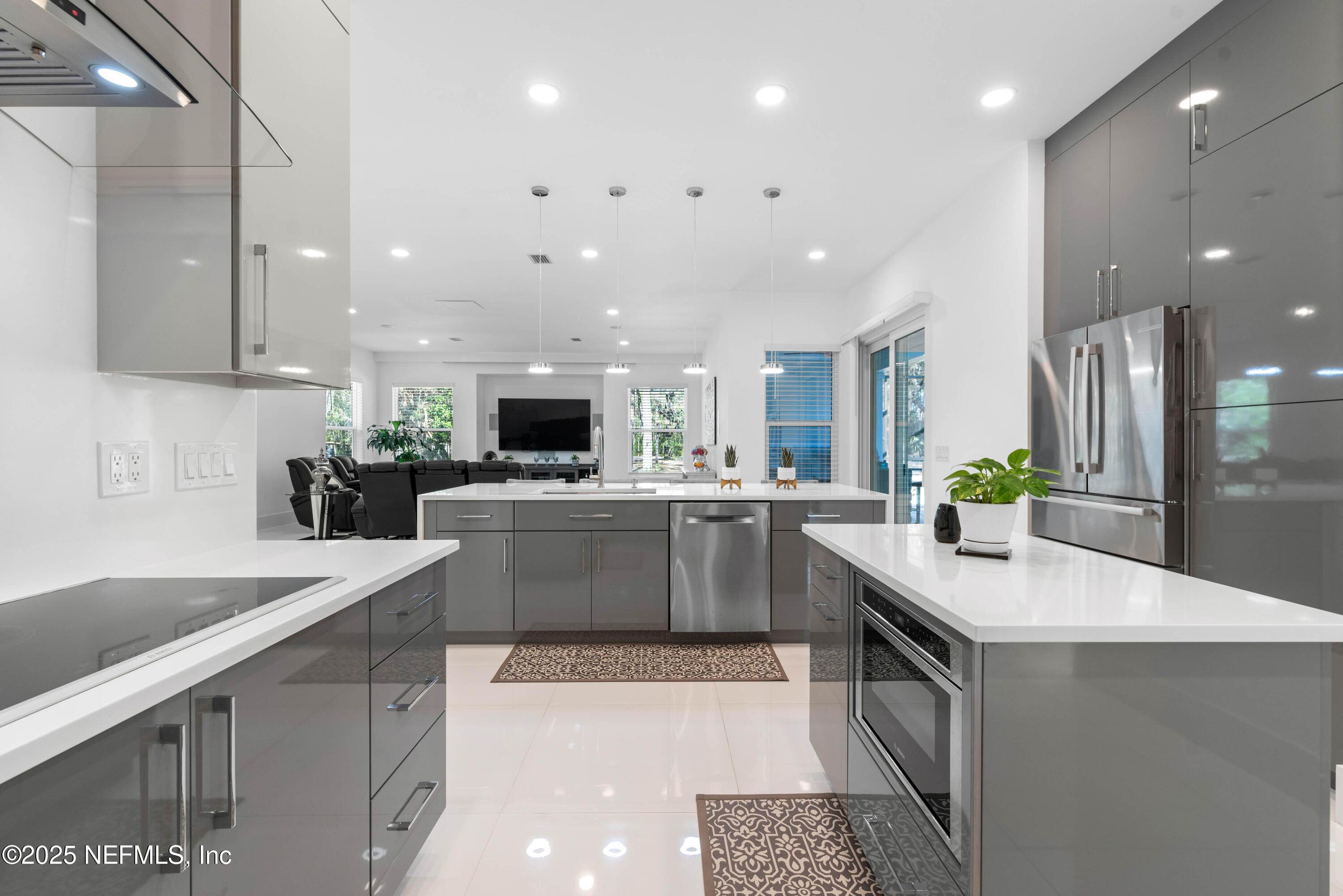 95494 Arbor Lane Fernandina Beach, FL 32034 - Photo 26 of 45 a kitchen with a sink a counter top space stainless steel appliances and cabinets