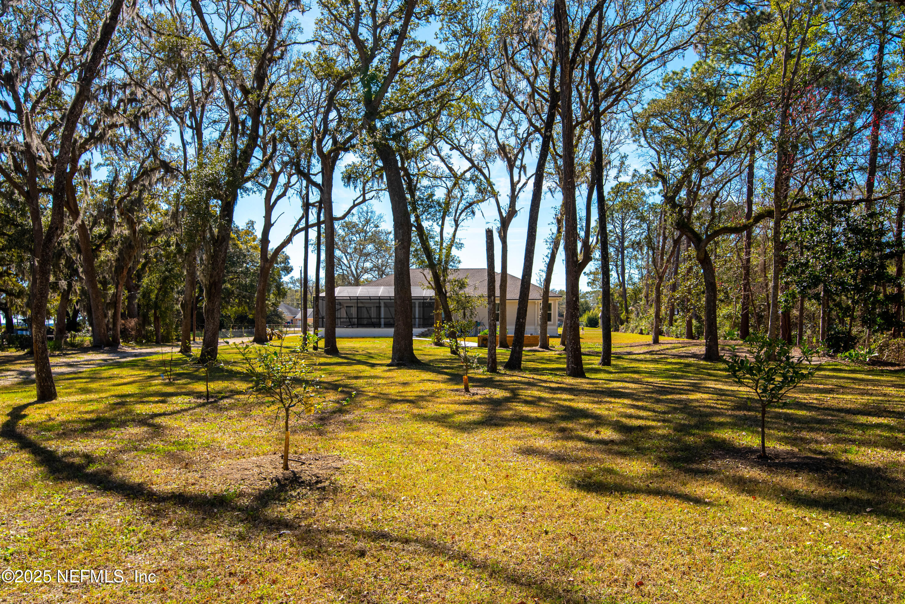 95494 Arbor Lane Fernandina Beach, FL 32034 - Photo 41 of 45 a view of a swimming pool with an outdoor space and seating area