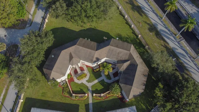 an aerial view of a highlighted house