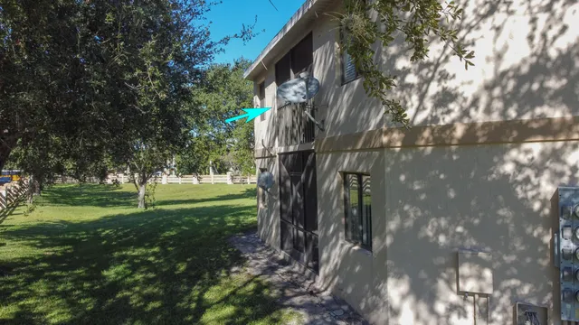 a backyard of a house with lots of green space