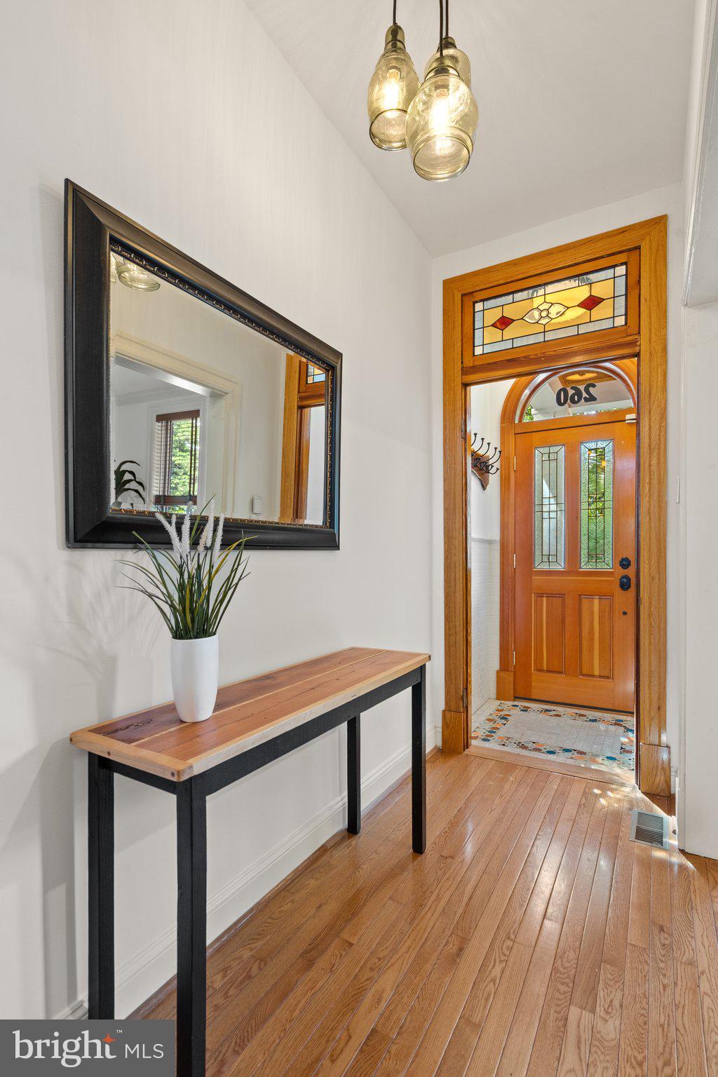 260 15th Street Southeast Washington, DC 20003 - Photo 4 of 41 Tiled front foyer with cloak rack.