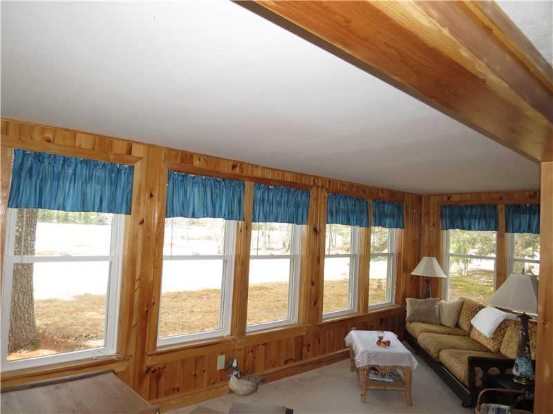 547 Hancock Pond Road Sebago, ME 04029 - Photo 4 of 35 Sunroom. Wonderful Water Views from...