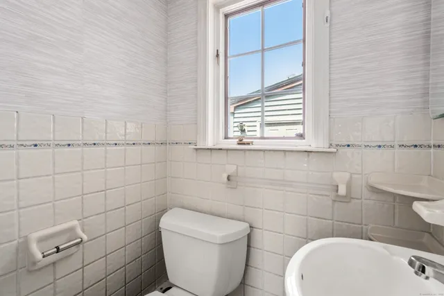 a living room with furniture pool table and a table