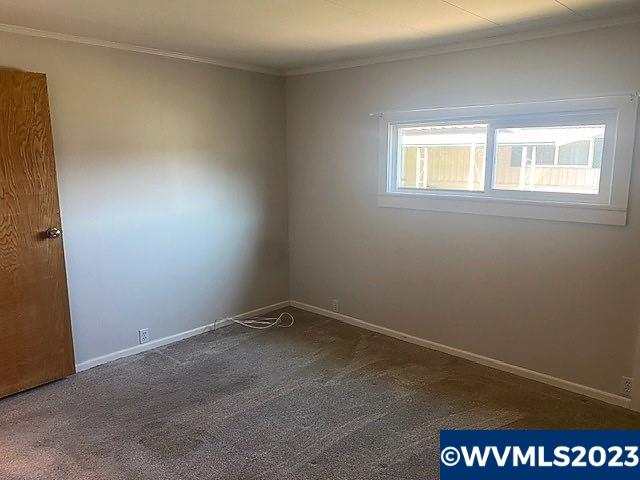 4940 Sunnyside Road Southeast, Unit F3 Salem, OR 97302 - Photo 12 of 18 a view of an empty room with a window