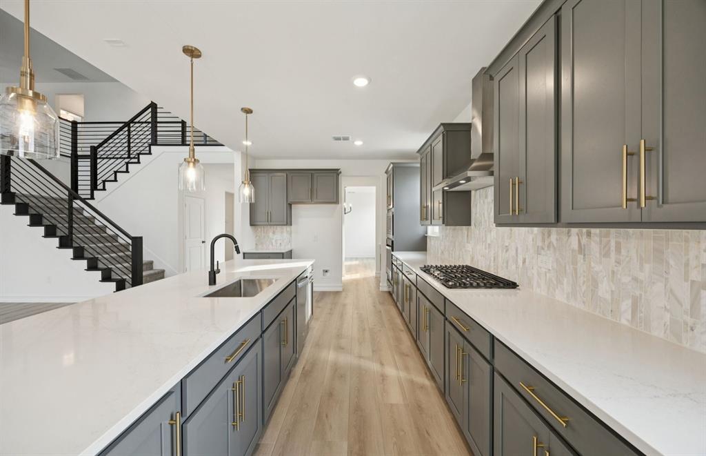 11220 Abbotsbury Road Fort Worth, TX 76052 - Photo 6 of 29 Abundant cabinet space in kitchen *model representation