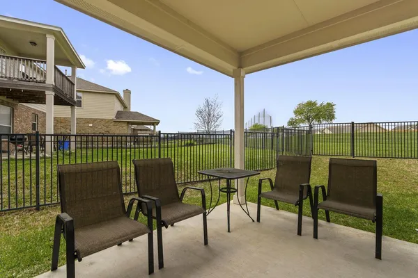 a view of a chairs in a patio