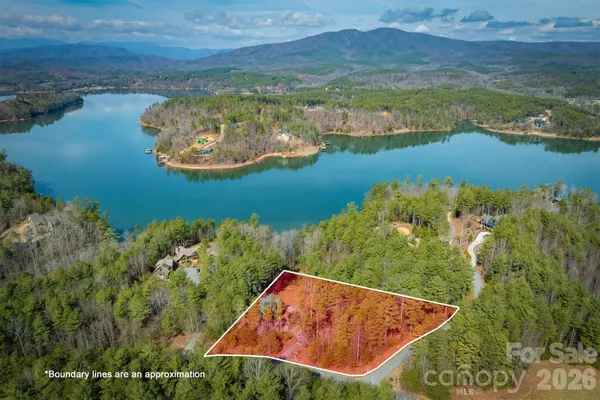 an aerial view of lake residential house and outdoor space
