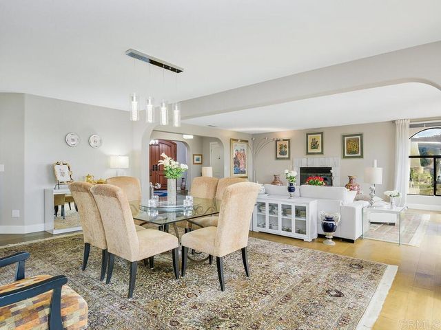 a kitchen with stainless steel appliances kitchen island granite countertop a sink and cabinets