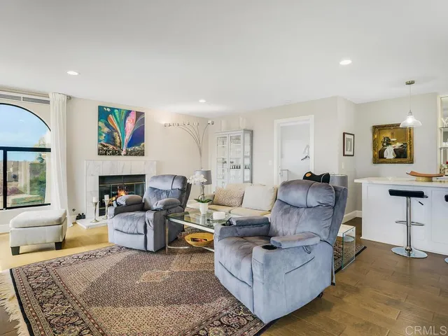 a bedroom with a bed and cabinets