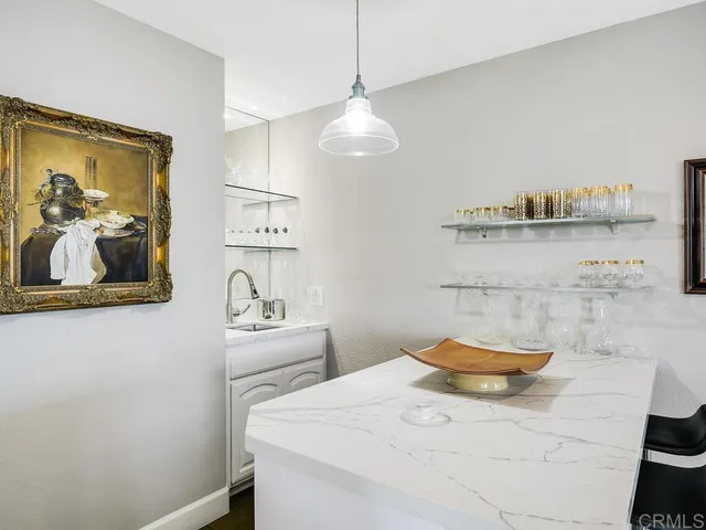 a bedroom with a bed and a fireplace