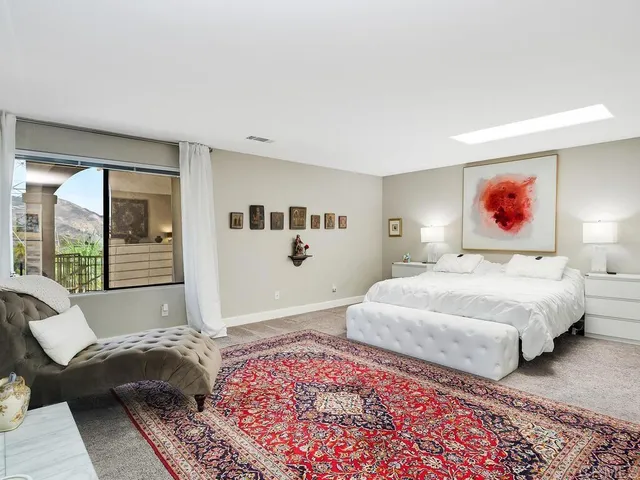 a large white room with a large window