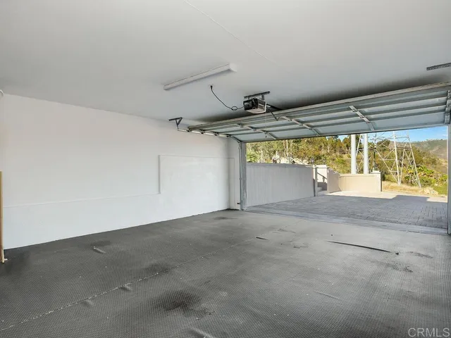 a view of a backyard with sitting area