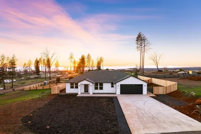 a view of a house with garden