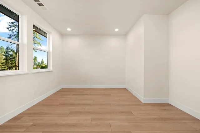 a bedroom with a large bed and a couch