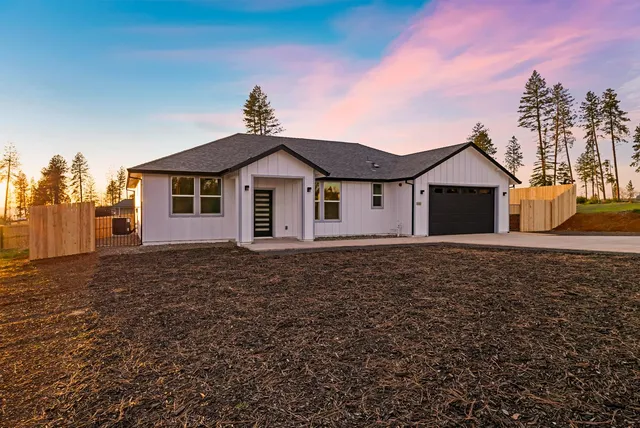 a view of a town with palm trees
