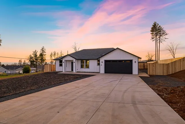 a view of a house with a ocean view