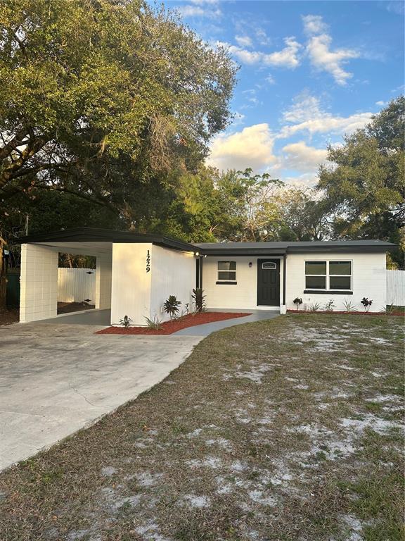 front view of a house next to a road