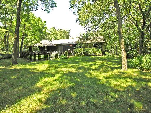 3337 Prairie Wind Road Long Grove, IL 60047 - Photo 1 of 1 a view of a backyard with swimming pool